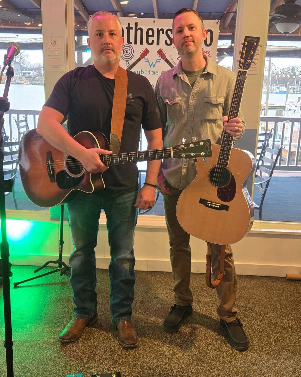 The two brothers of Brothers Duo with their acoustic guitars